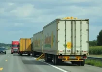 carretas com soja e latas de cerveja